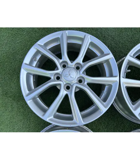 5x114.3 16" Mitsubishi gyári alufelni +TPMS szenzor 6,5Jx16h2 ET46 5