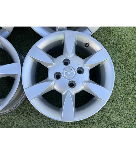 4x100 14" Mazda alufelni 6Jx14h2 ET45 - Mobil Gumis 4