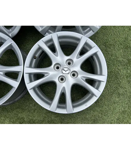 4x100 16" Mazda gyári alufelni 6,5Jx16h2 ET50 - Mobil Gumis 4