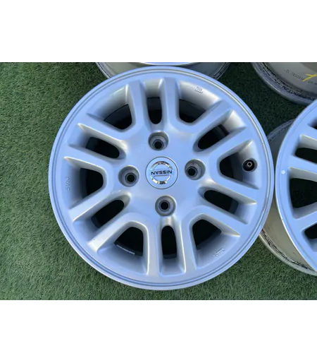 4x114.3 14" Nissan gyári alufelni 5,5Jx14h2 ET45 2