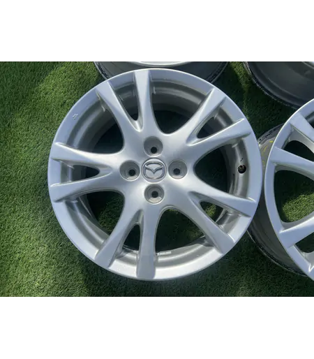 4x100 16" Mazda gyári alufelni 6,5Jx16h2 ET50 2