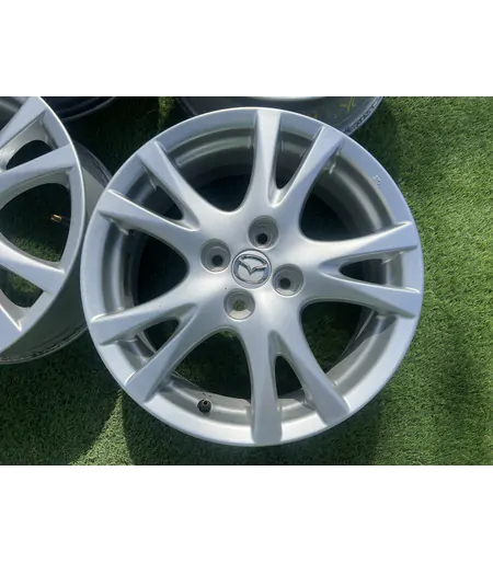 4x100 16" Mazda gyári alufelni 6,5Jx16h2 ET50 3