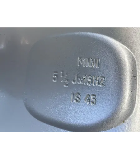 4x100 15" Mini gyári alufelni 5,5Jx15h2 ET45 7